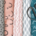 Stoffe mit bunten Mustern und Schere