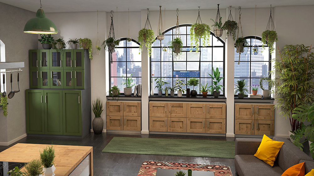 Grüne Anrichte in einer Küche mit vielen Pflanzen und Lowboards mit Massiv-Rahmenfront unter den Fenstern